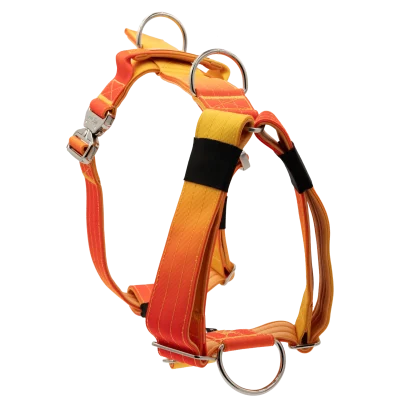 Arnés táctico Sunset de DoggyCraft para perros, degradado de amarillo a naranja y rojo, con anilla frontal antitirones y asa de emergencia